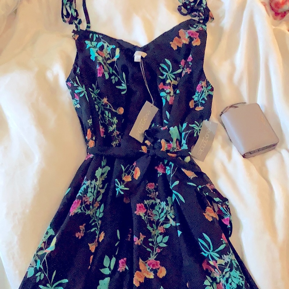 Beautiful tie strap floral Eva Mendes dress
